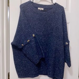 Sweater with button sleeve detail